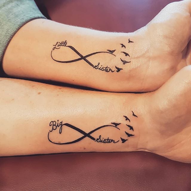 Sister Symbol Tattoos.jpg
