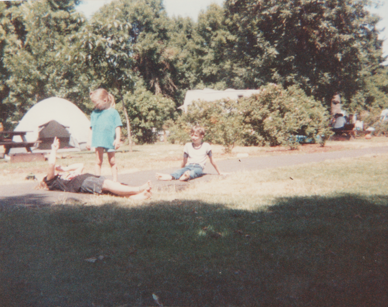1991-08 - Camping - Joey, Rick, Crystal, Katie, mom, dad, others, tent, picnic table, field, food, playing, includes maybe Sunday or weekend-3.png