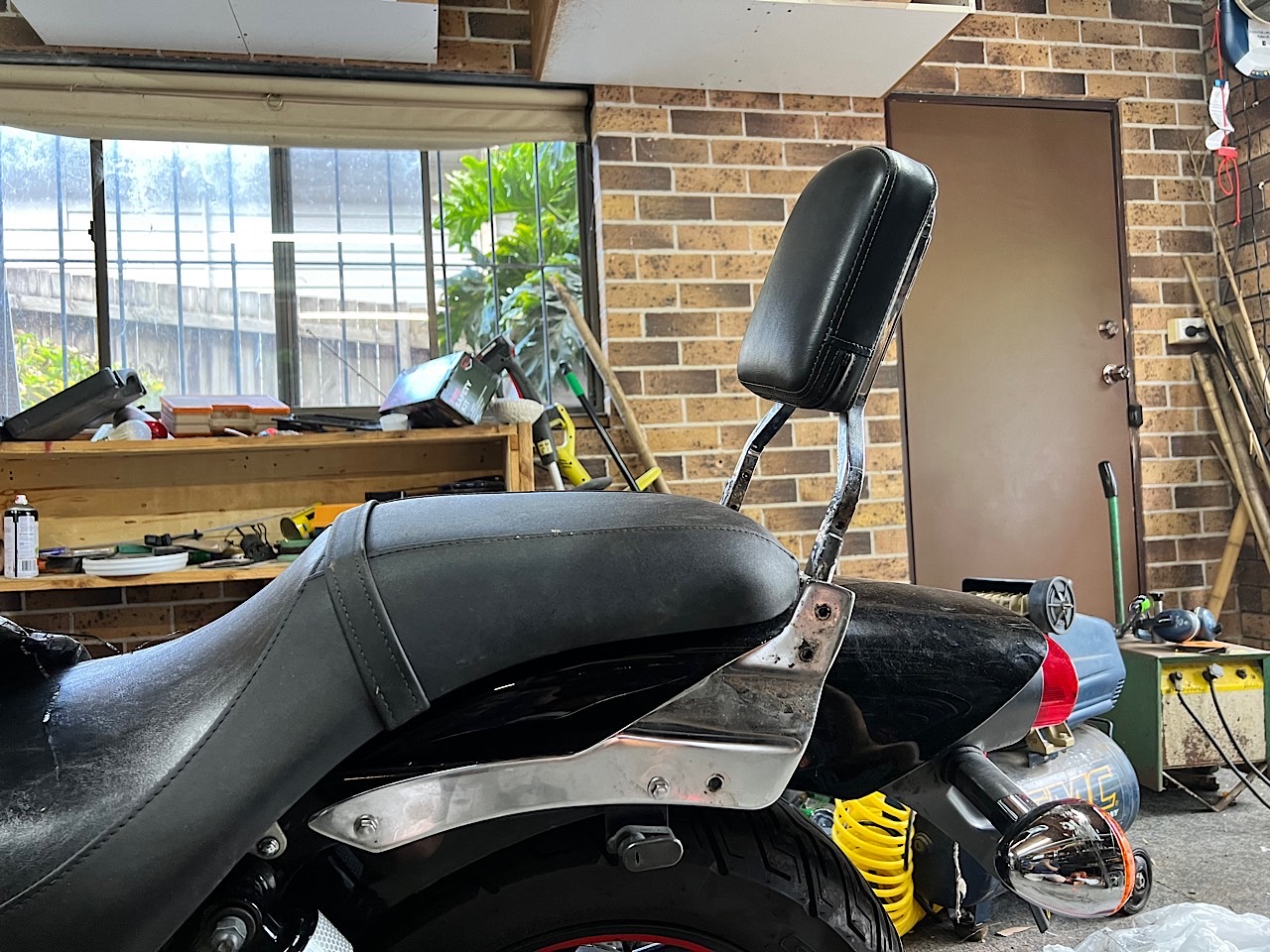 Testing a modified Yamaha sissy bar on a Kawasaki