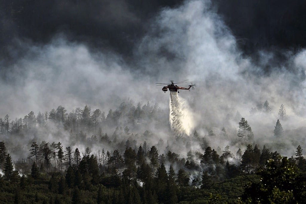 helicopter-dropping-water-forest-fire-burning-nature-landscapes-3ee2f3-1024.jpg