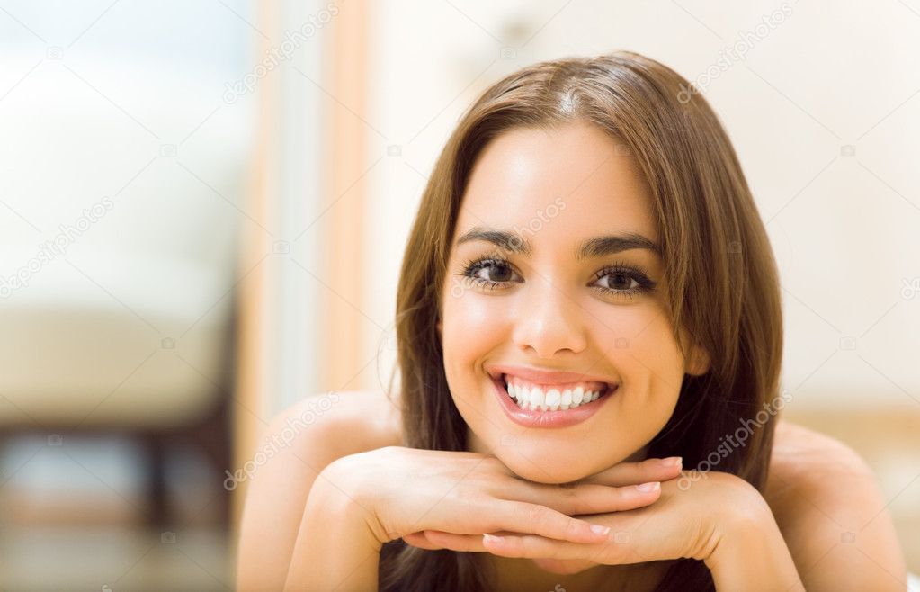 depositphotos_9830876-stock-photo-portrait-of-young-smiling-woman.jpg