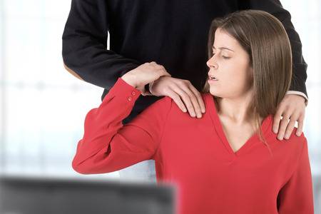 71374749-woman-suffering-from-sexual-harassment-in-the-workplace.jpg