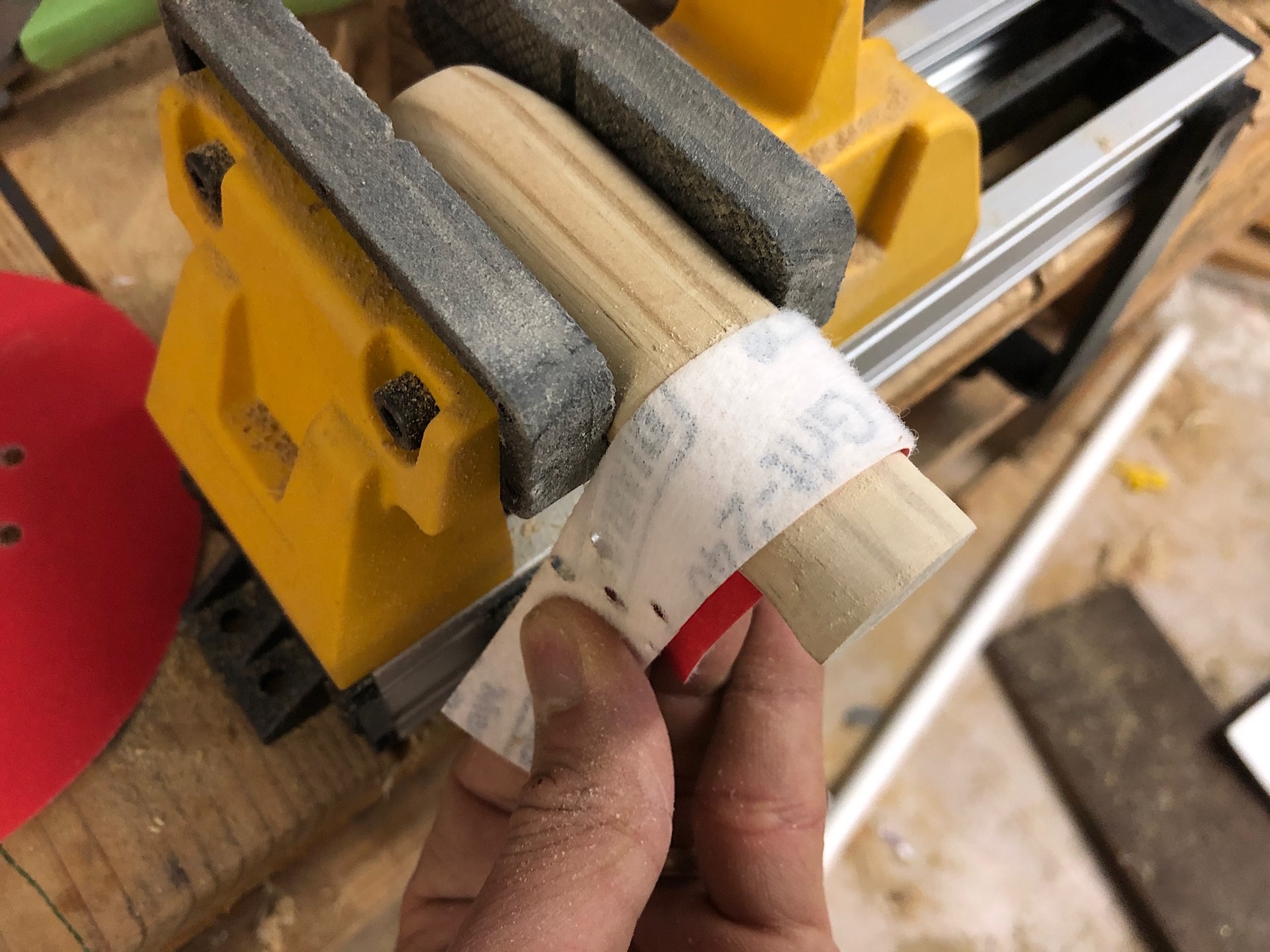 Sanding the wood handle