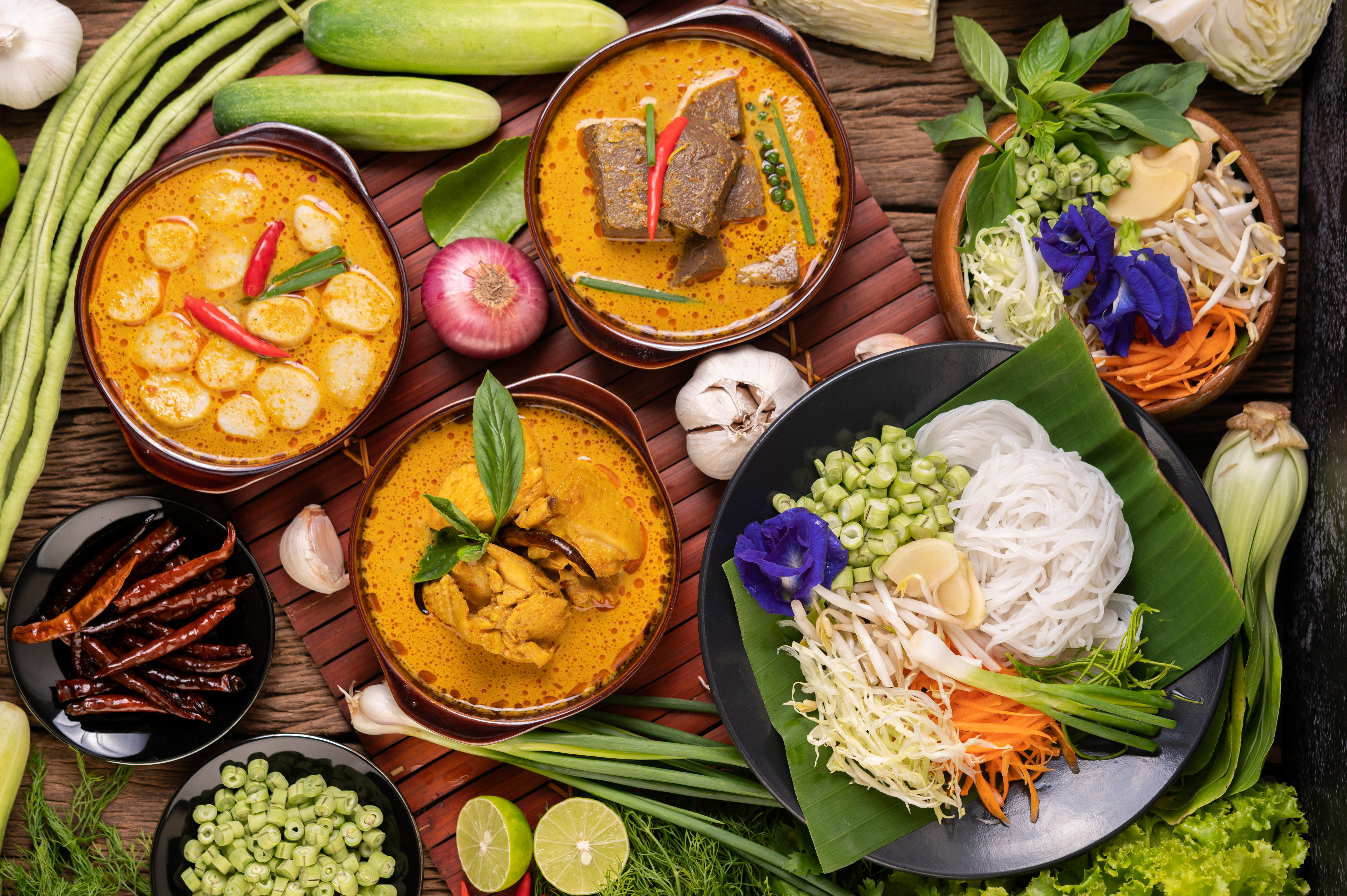 rice-noodles-bowl-curry-paste-with-chili-cucumber-long-bean-lime-garlic-spring-onion.jpg