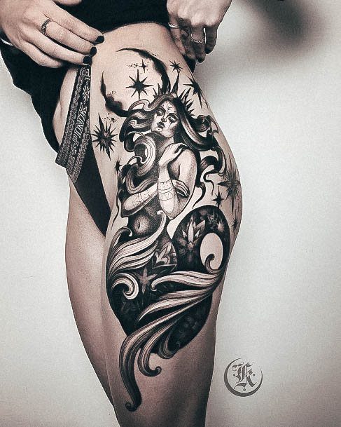 charming-tattoos-for-women-mermaid-thigh-hip.jpg