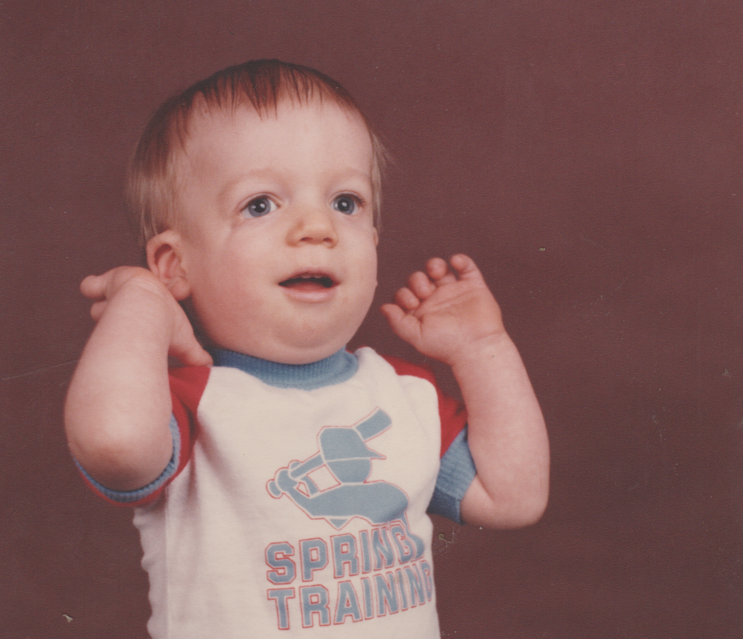 1983-04 - Rick in Spring Training Shirt, Spring of 83, wide angle, I guess it was in April, 1pic.png