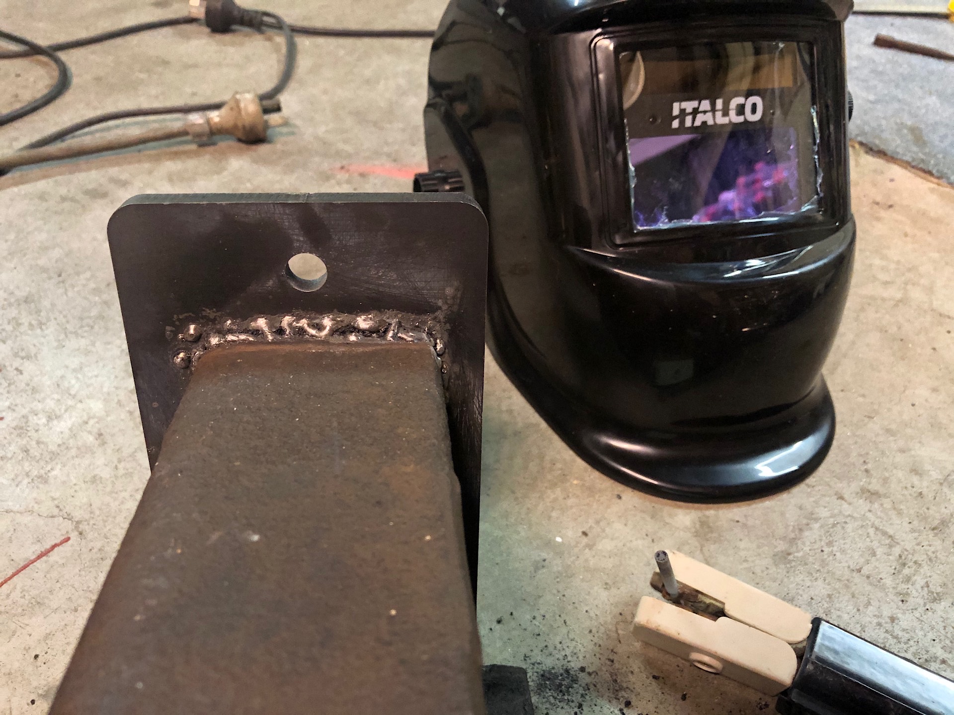 Welding a steel plate to a rail track