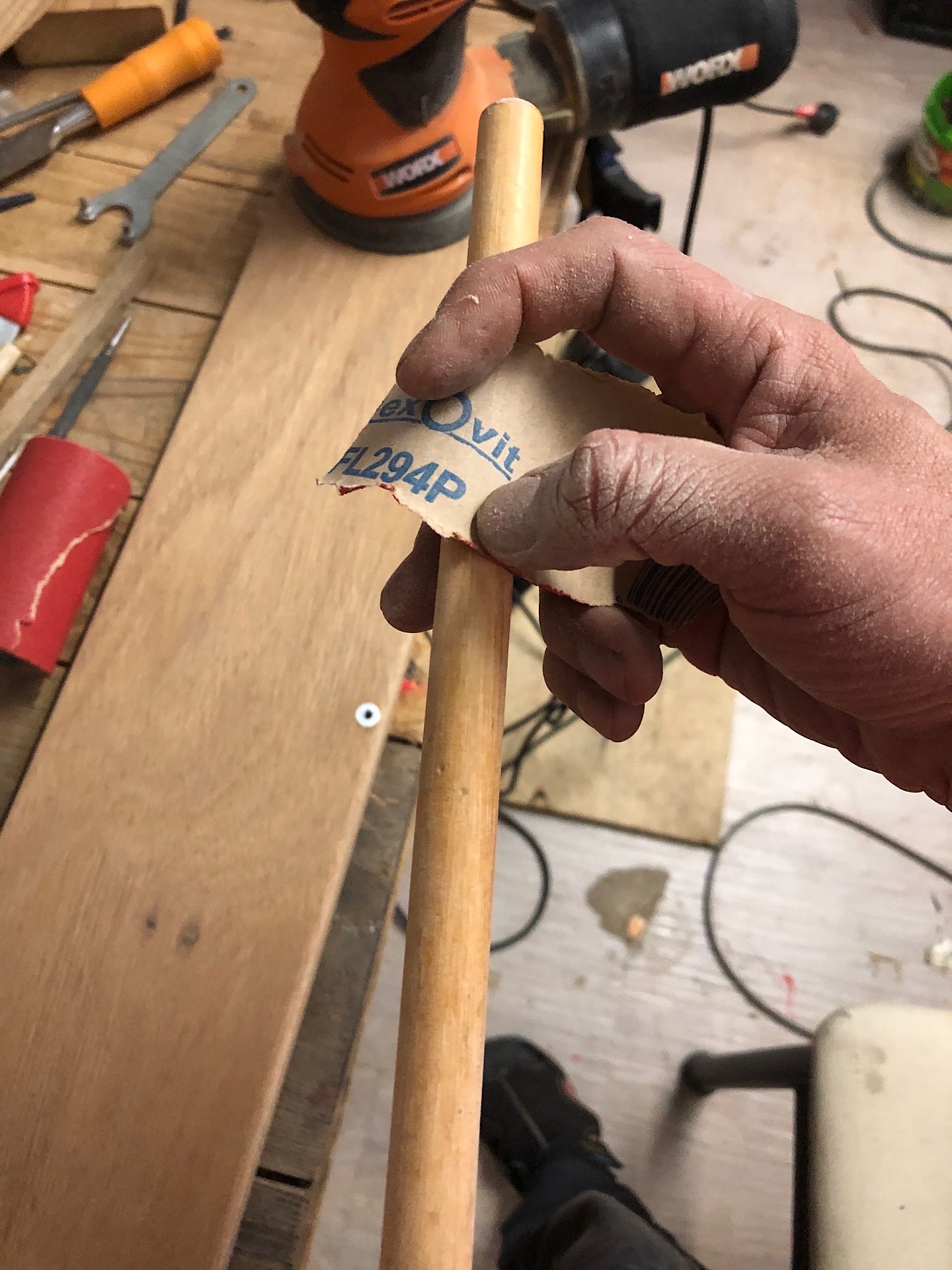 Sanding round a wooden stick