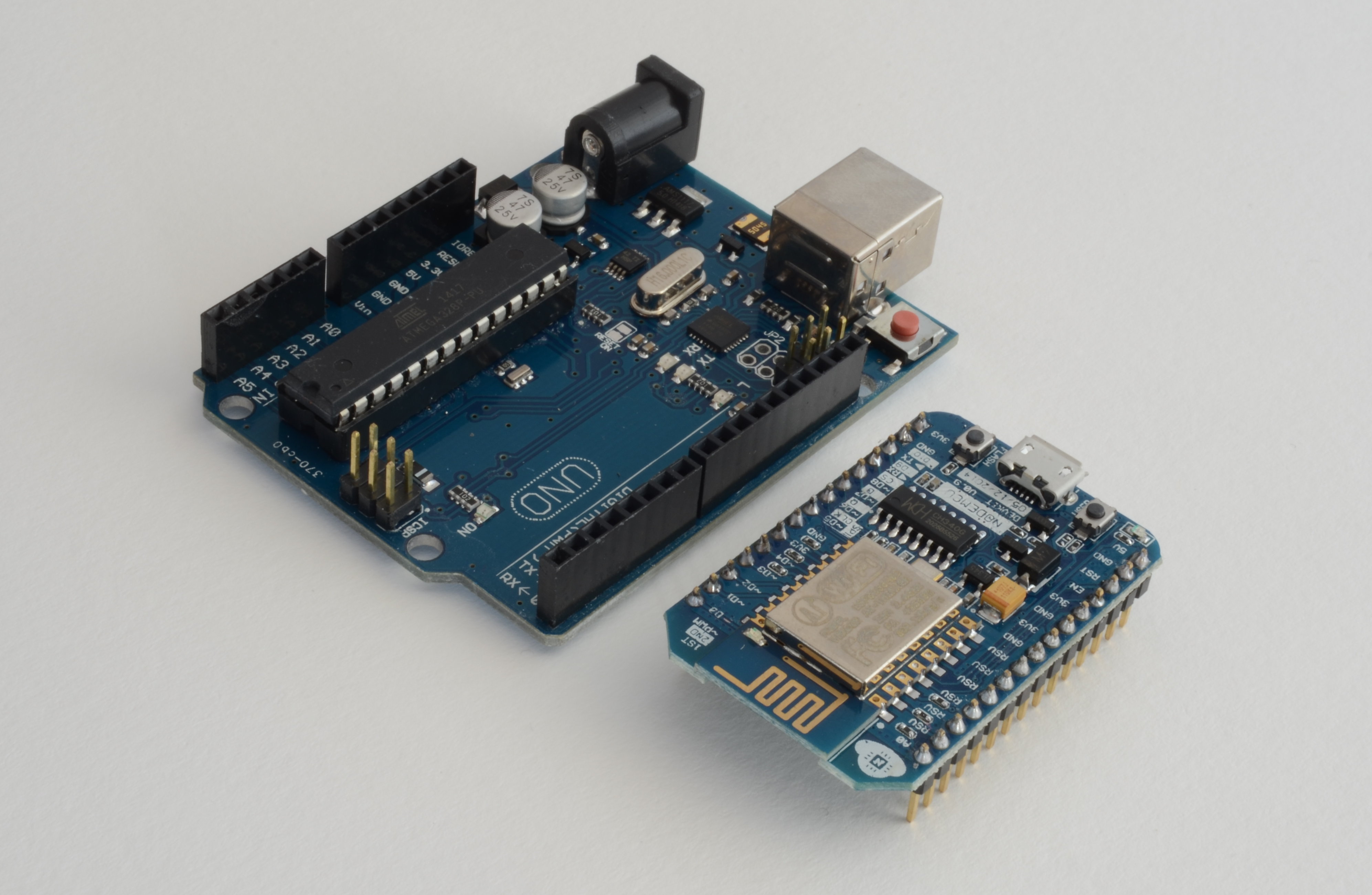 Comparison-between-Arduino-Uno-development-board-and-NodeMCU-board-based-on-ESP8266.jpg