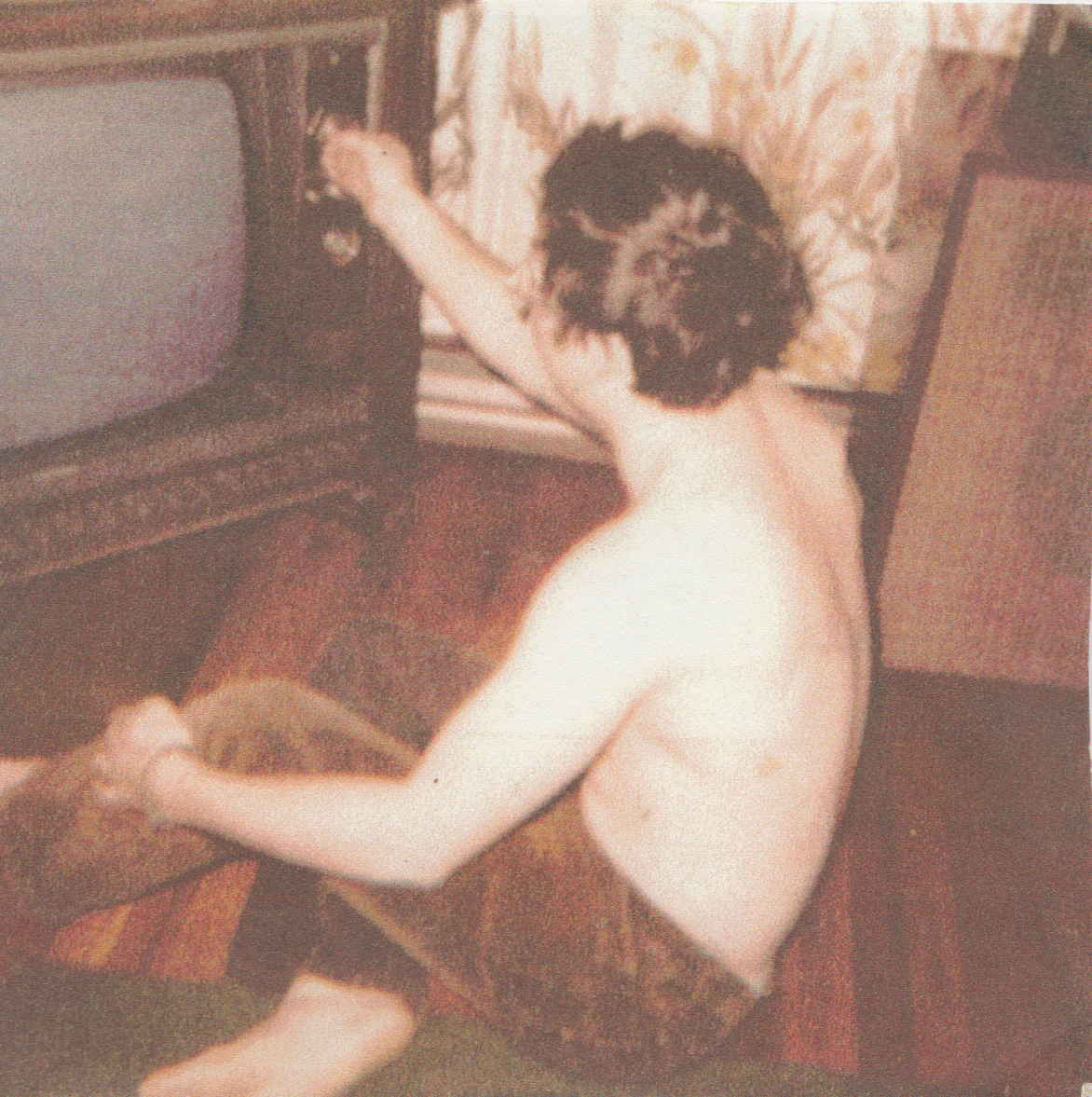 1960s - Don Arnold - watching TV - probably the 60s and I think it is Don but I am only guessing smaller size.png
