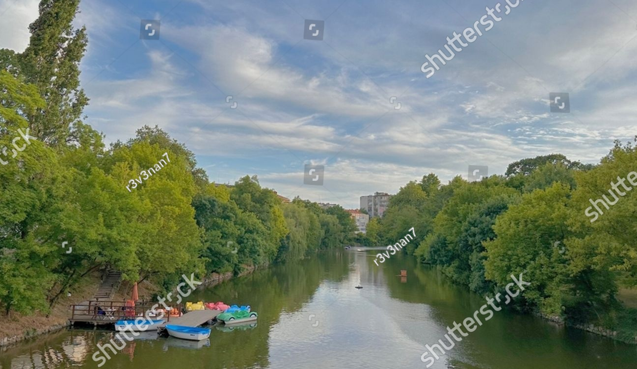 stock-photo-discover-the-peaceful-aura-of-yambol-bulgaria-with-this-idyllic-riverside-capture-boats-at-rest-2315827177.jpg