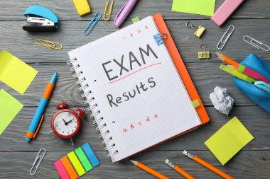 depositphotos_352843958-stock-photo-inscription-exam-results-stationary-wooden.jpg