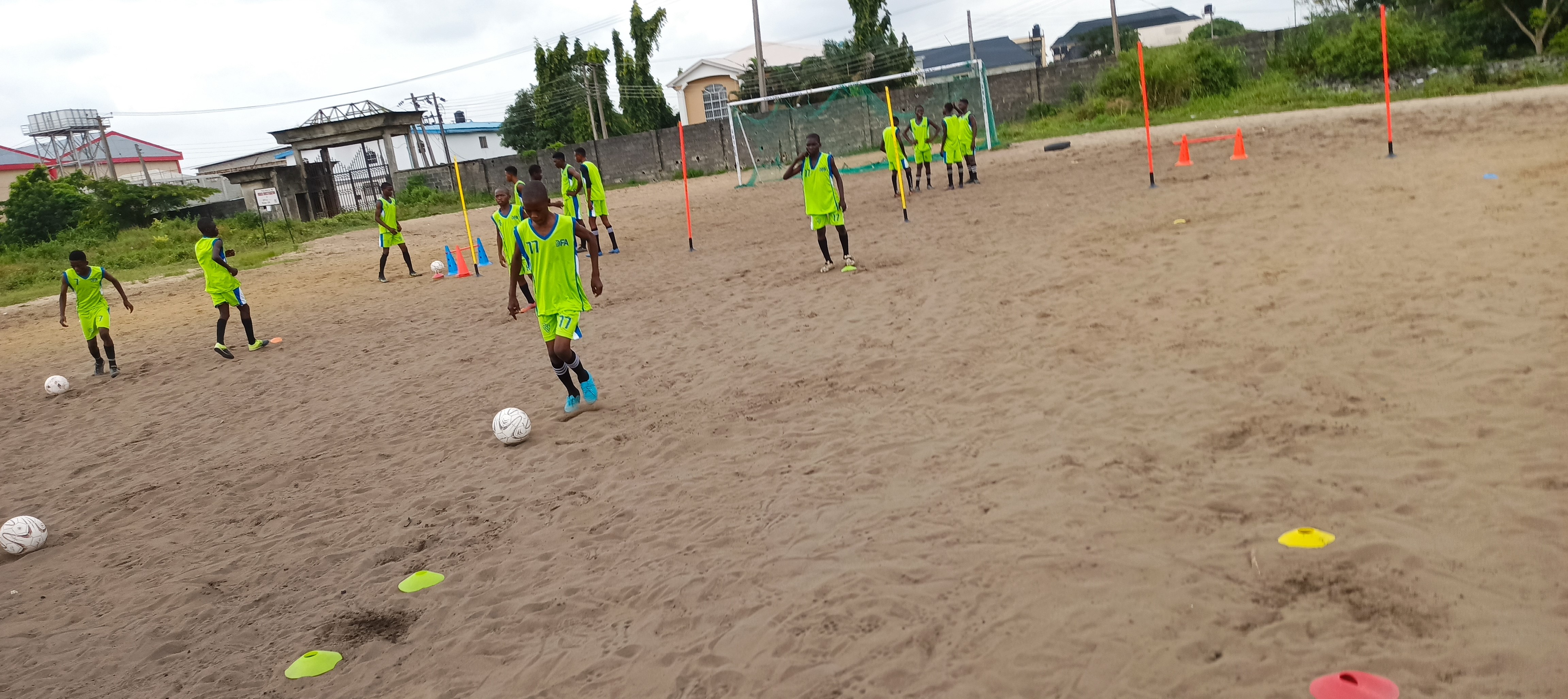 Decentralized Football Academy DFA footballers training ground pitch.jpg