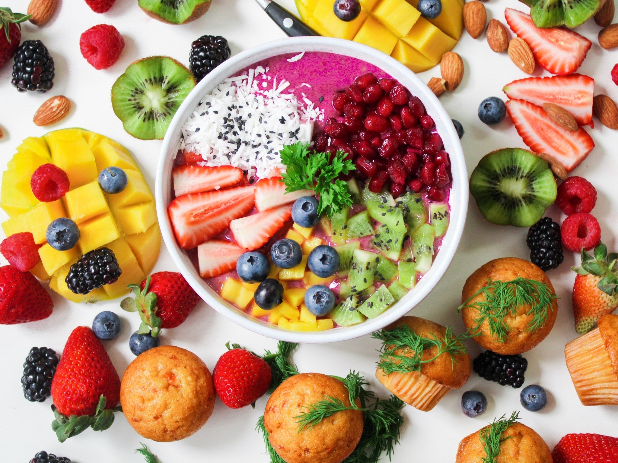 assorted-sliced-fruits-in-white-ceramic-bowl-1092730.jpg