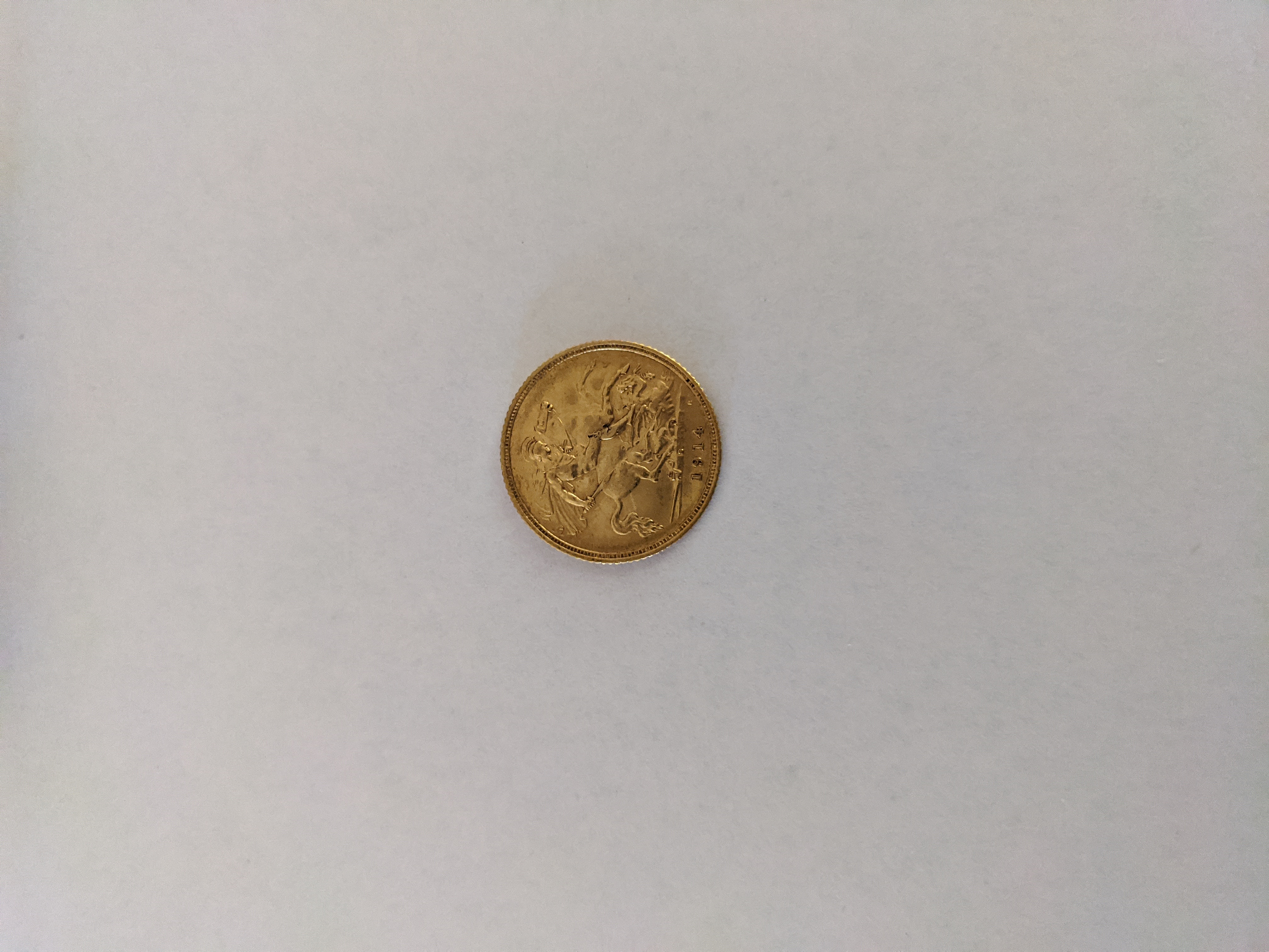 Front 1914 Half Sovereign Coin 3.6575 Grams.jpg