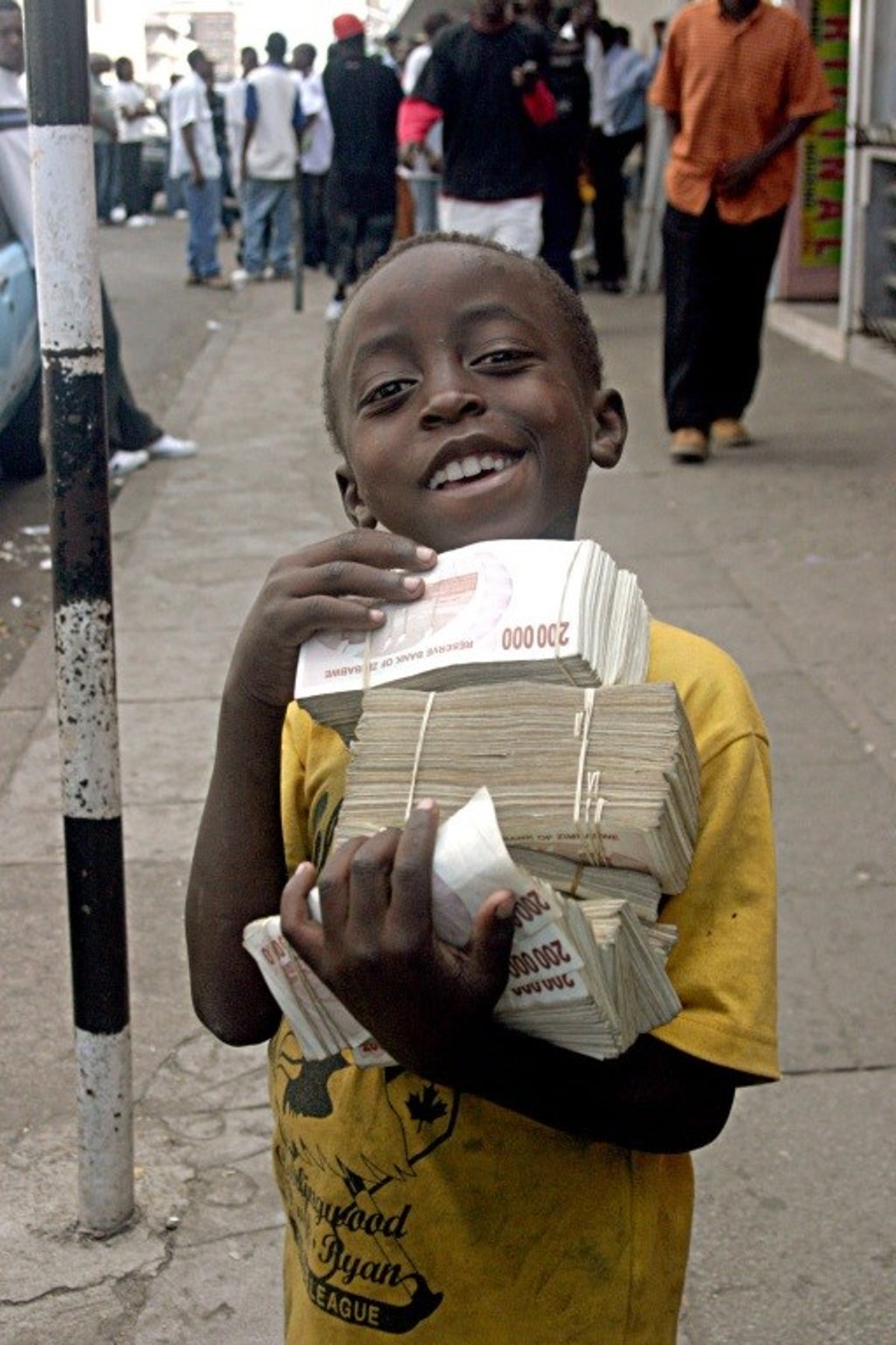 tendai-holding-money.jpg