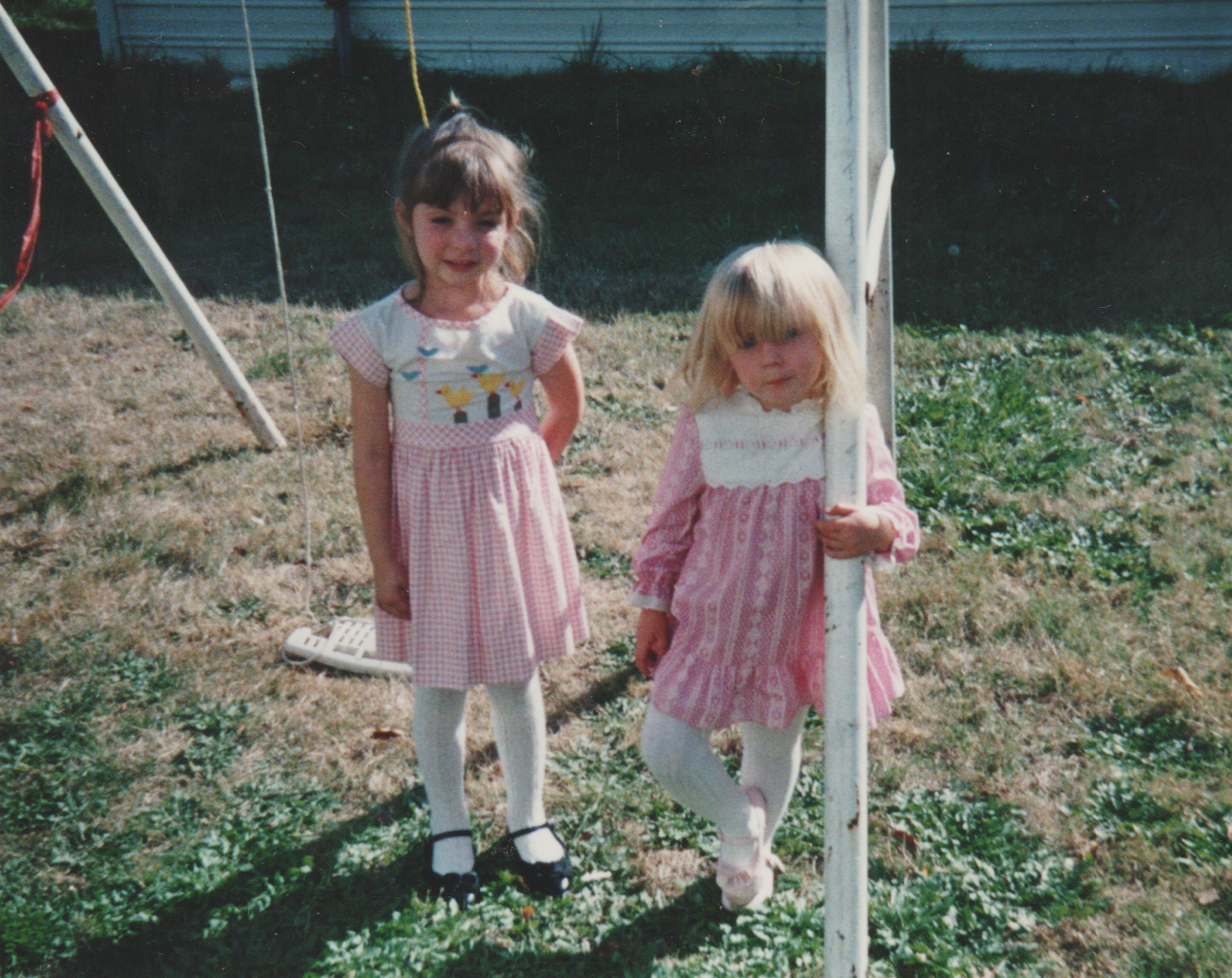 1992-09 - Photoshoot, Tiffany Cumbo, Crystal Arnold, both in pink dresses at swings in the 163 backyard.png