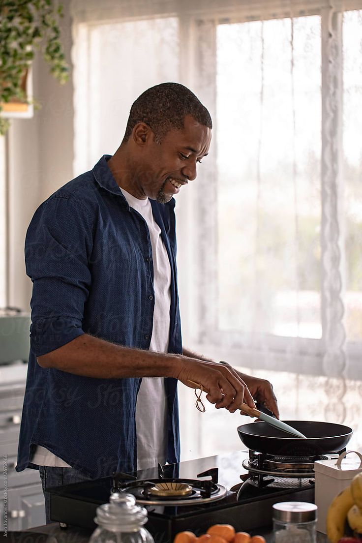 _Man Preparing Breakfast In The Kitchen_ by Stocksy Contributor _Jovo Jovanovic_.jpeg