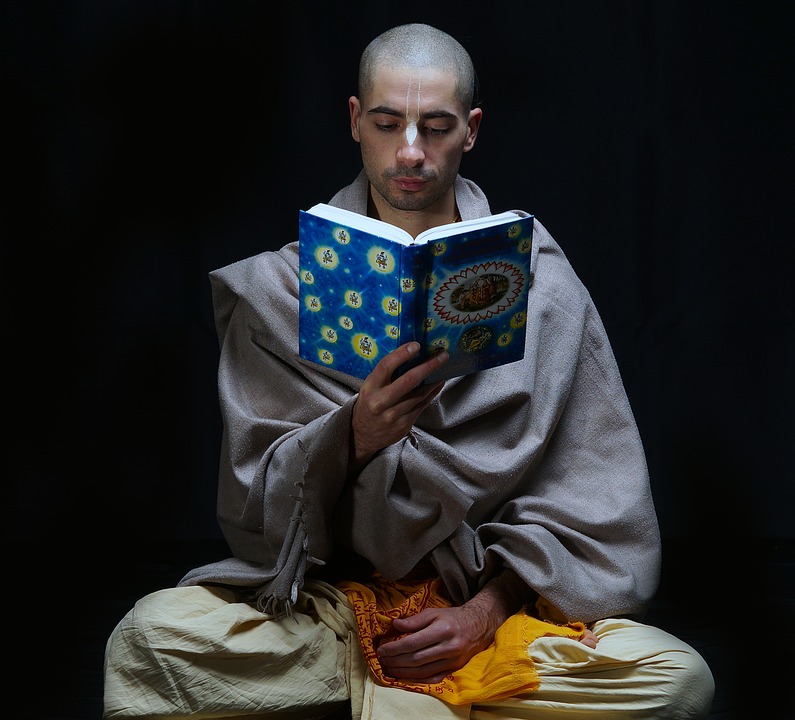 Vaishnava reading Bhagavatam pixa.jpg
