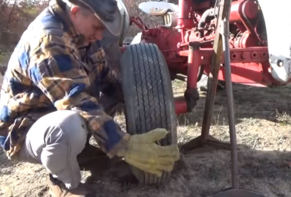 Putting-New-Tire-On-Ford-Tractor.jpg