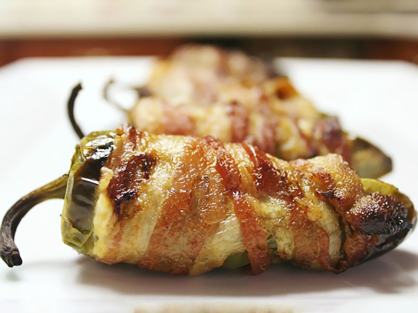 233603-Bacon-Wrapped-Jalapeno-Poppers-hungryallweighs-4x3jpg-9e0b436b8ba44abda8b77dd4385e2235.jpg