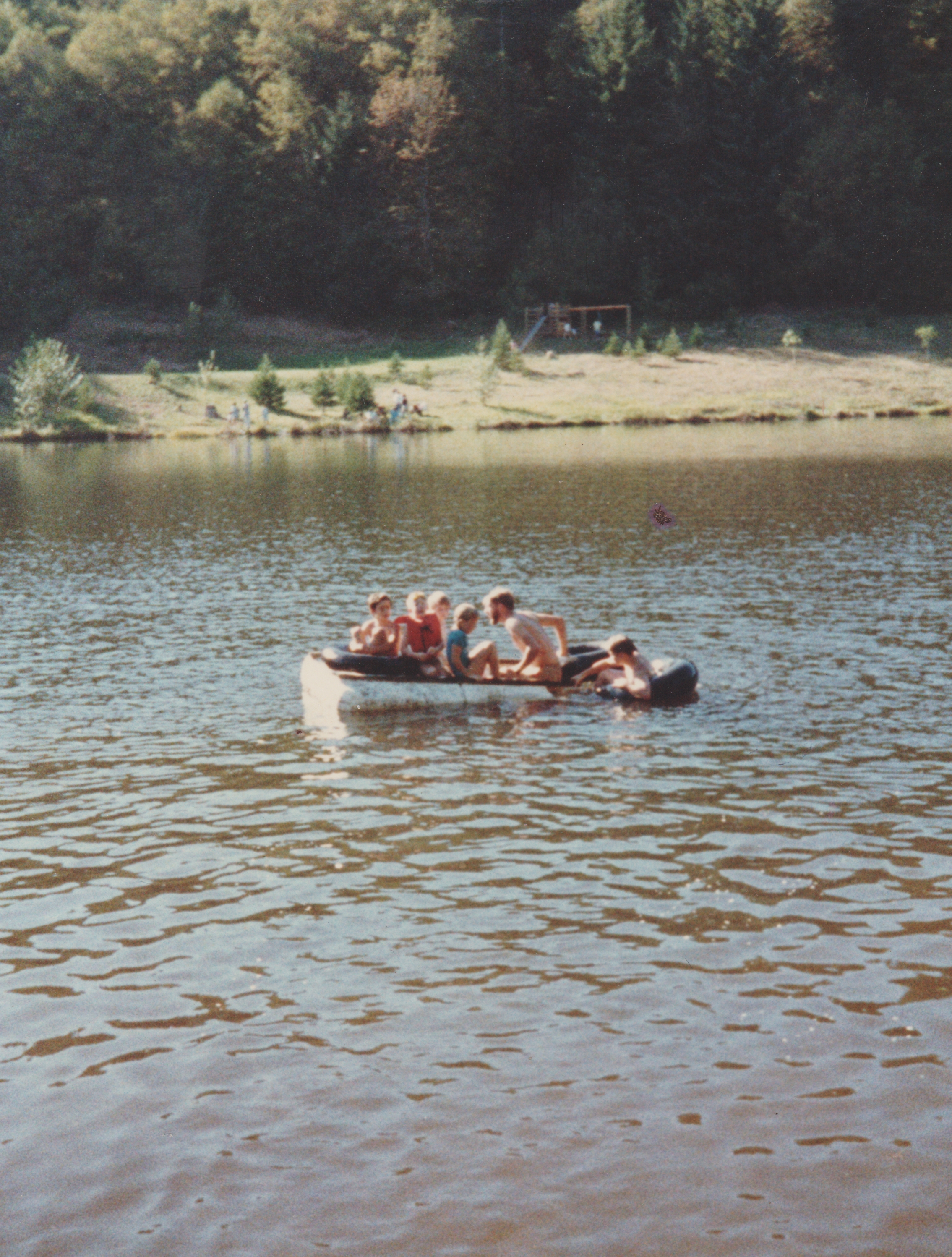 1980's maybe - Katie maybe - lake - kids - man - raft thing.jpg