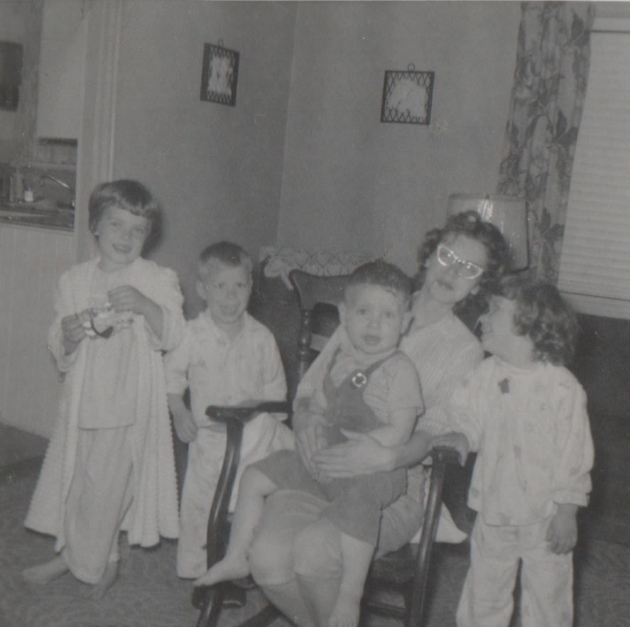 1961-03 - Little House on 85th - Terry, Dave, Derek, Babe, Sandy, 052A, March 1961, 1 woman, 2 boys, 2 girls, black and white, cropped to exlude the date.png