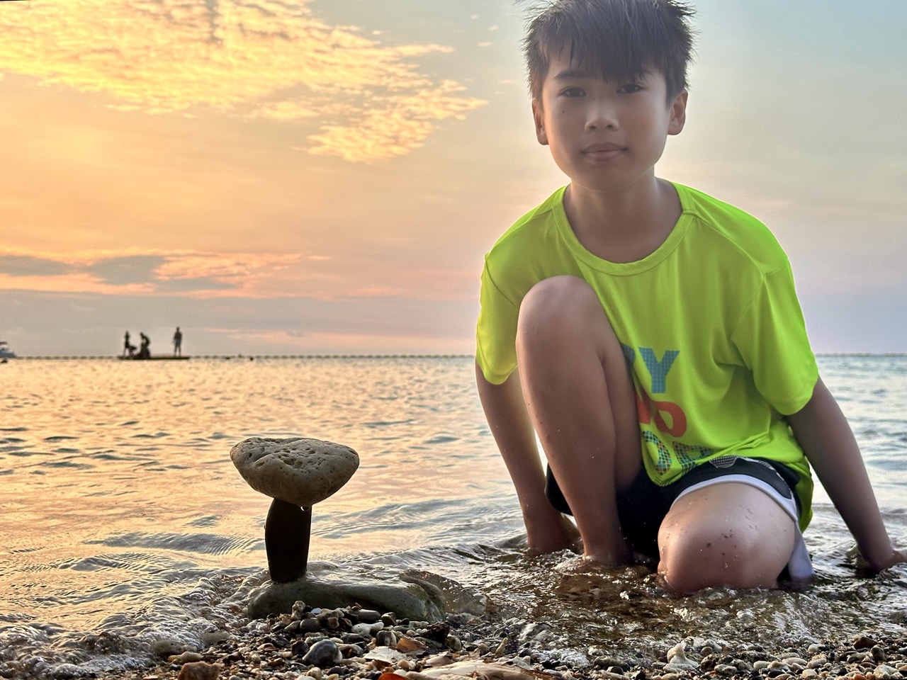 San doing rock balancing