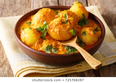 kashmiri-dum-aloo-spicy-potato-260nw-725768287.jpg