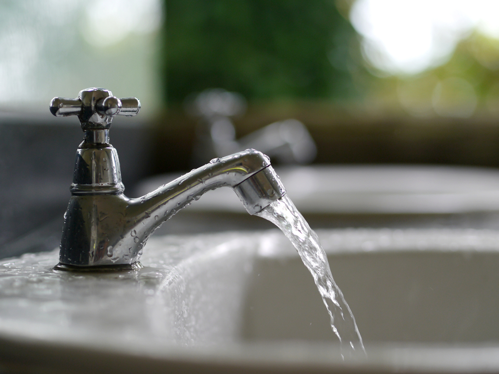 faucet-running-water-shutterstock_153406115.jpg