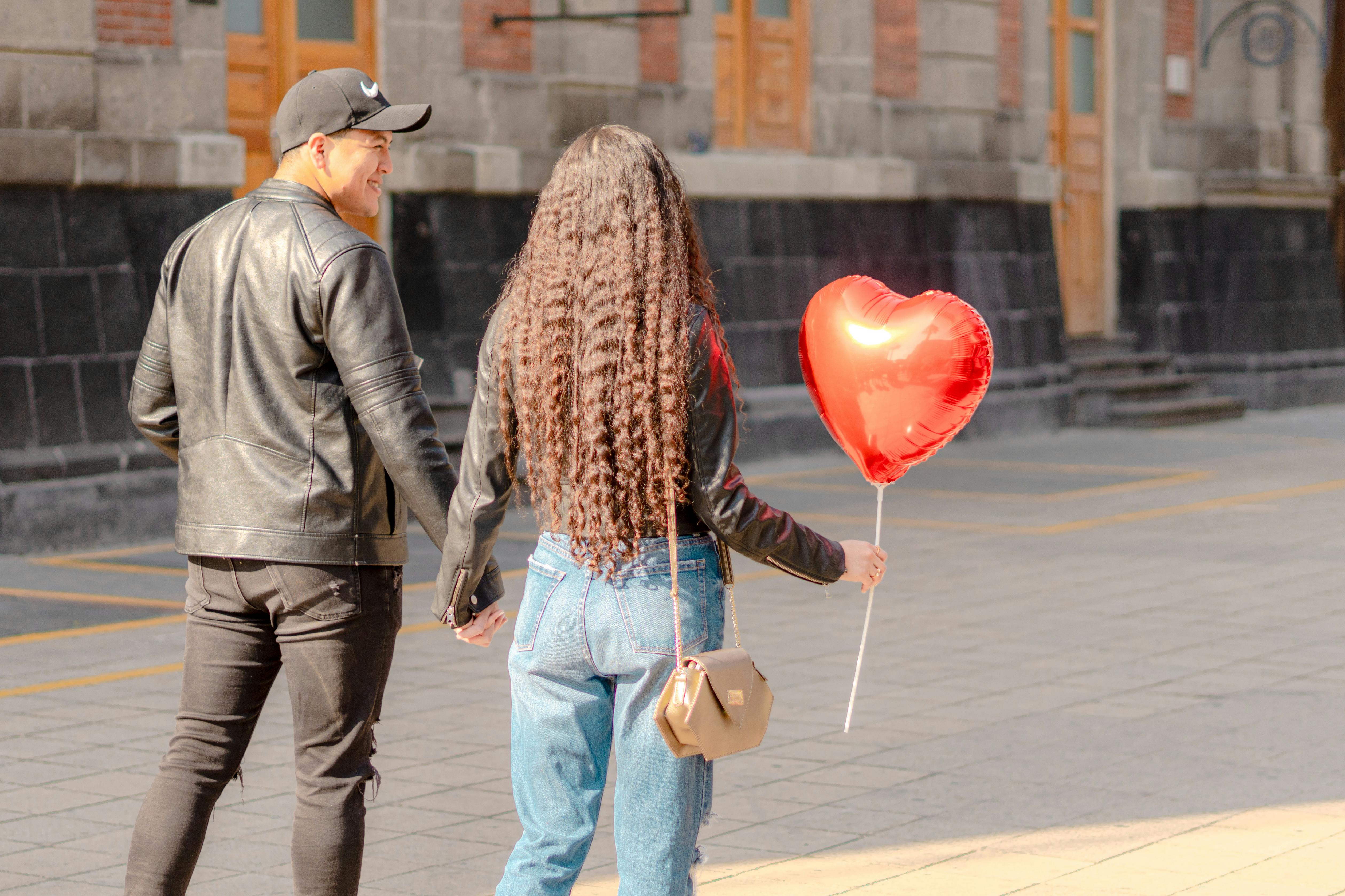  "free-photo-of-couple-holding-hands-on-a-street.jpeg"