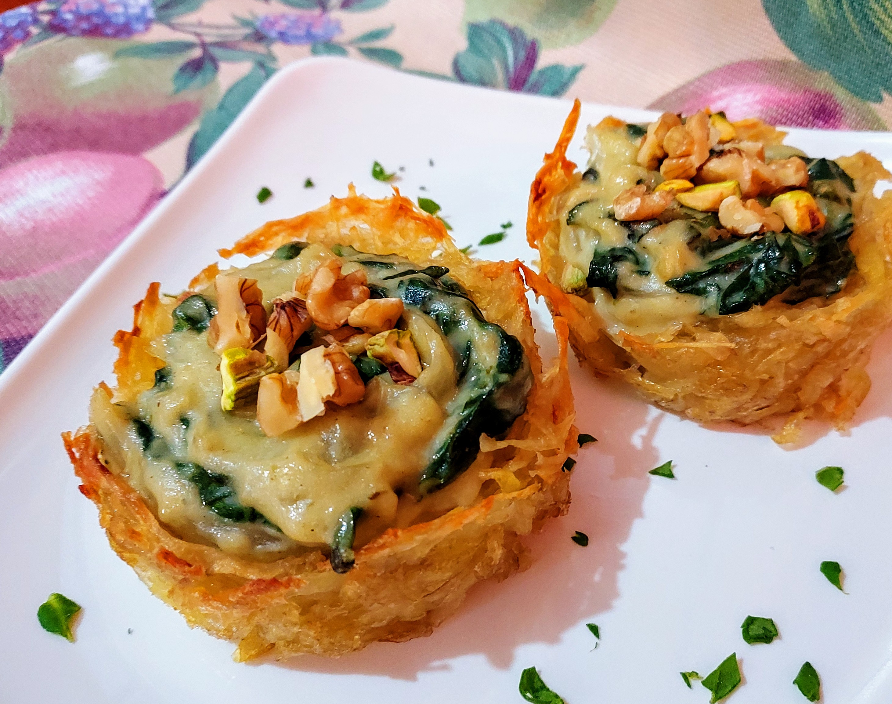 Delicious baskets of potatoes, with creamed spinach and onion..