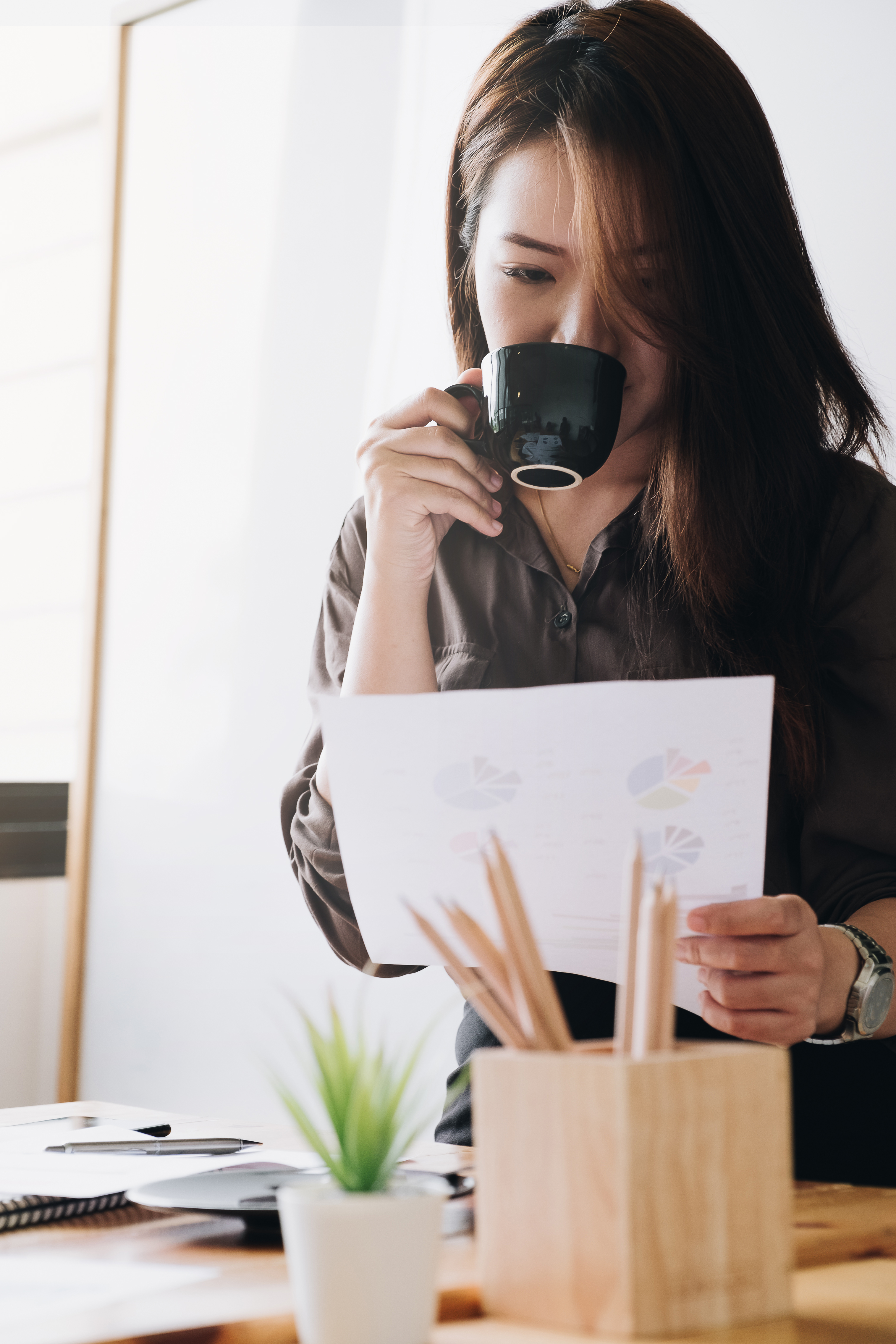  " "businesswoman-drinking-cup-of-coffee-before-workin-2022-11-12-13-06-22-utc.jpg""