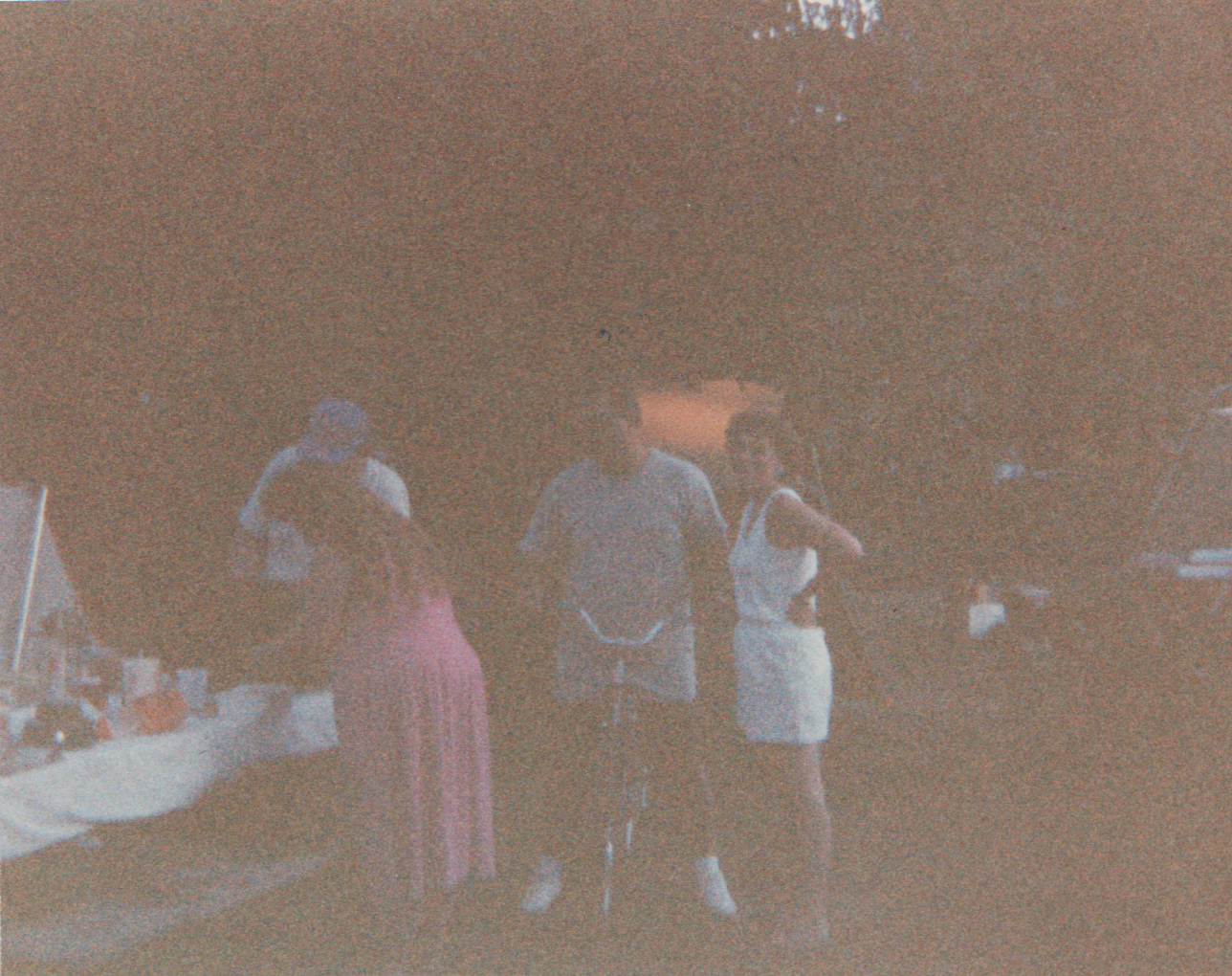 1991-08 - Camping - Joey, Rick, Crystal, Katie, mom, dad, others, tent, picnic table, field, food, playing, includes maybe Sunday or weekend-5.png
