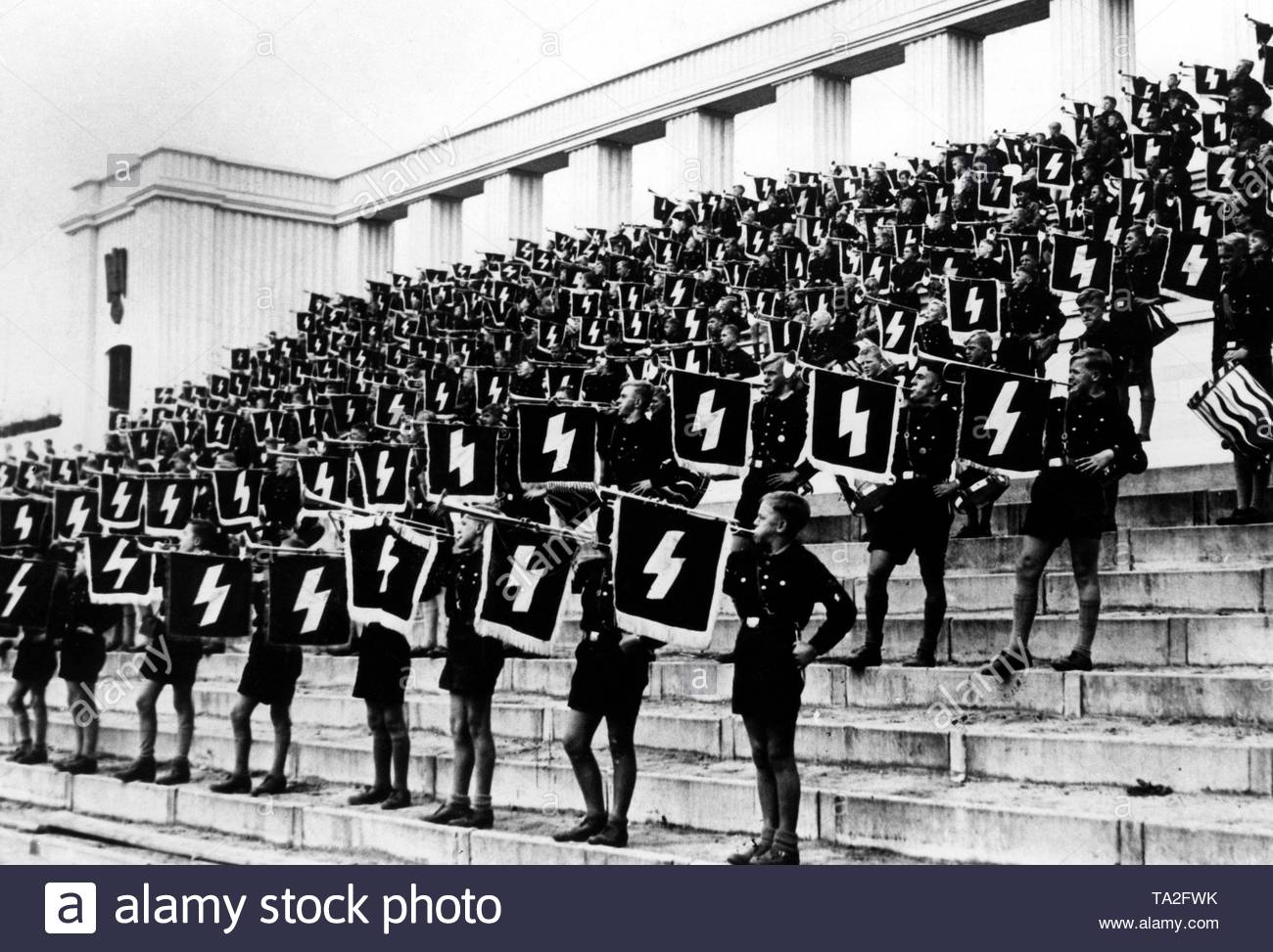 trumpeters-of-the-deutsches-jungvolk-are-blowing-their-trumpets-at-the-nuremberg-rally-of-the-nsdap-on-the-rally-grounds-TA2FWK.jpg