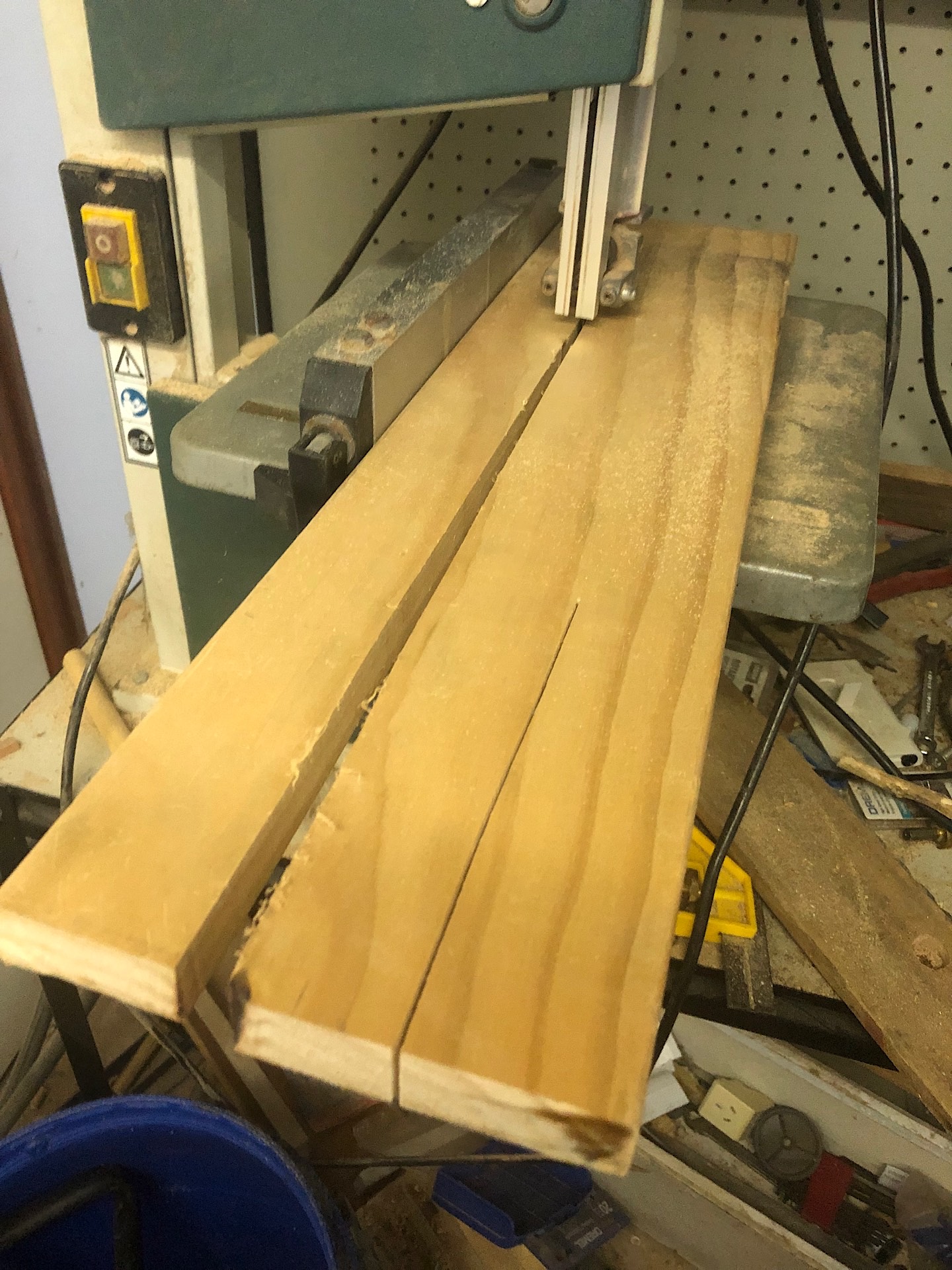 Cutting pine wood on a band saw