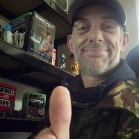benthumbsupoffice_copy_200x200.jpg