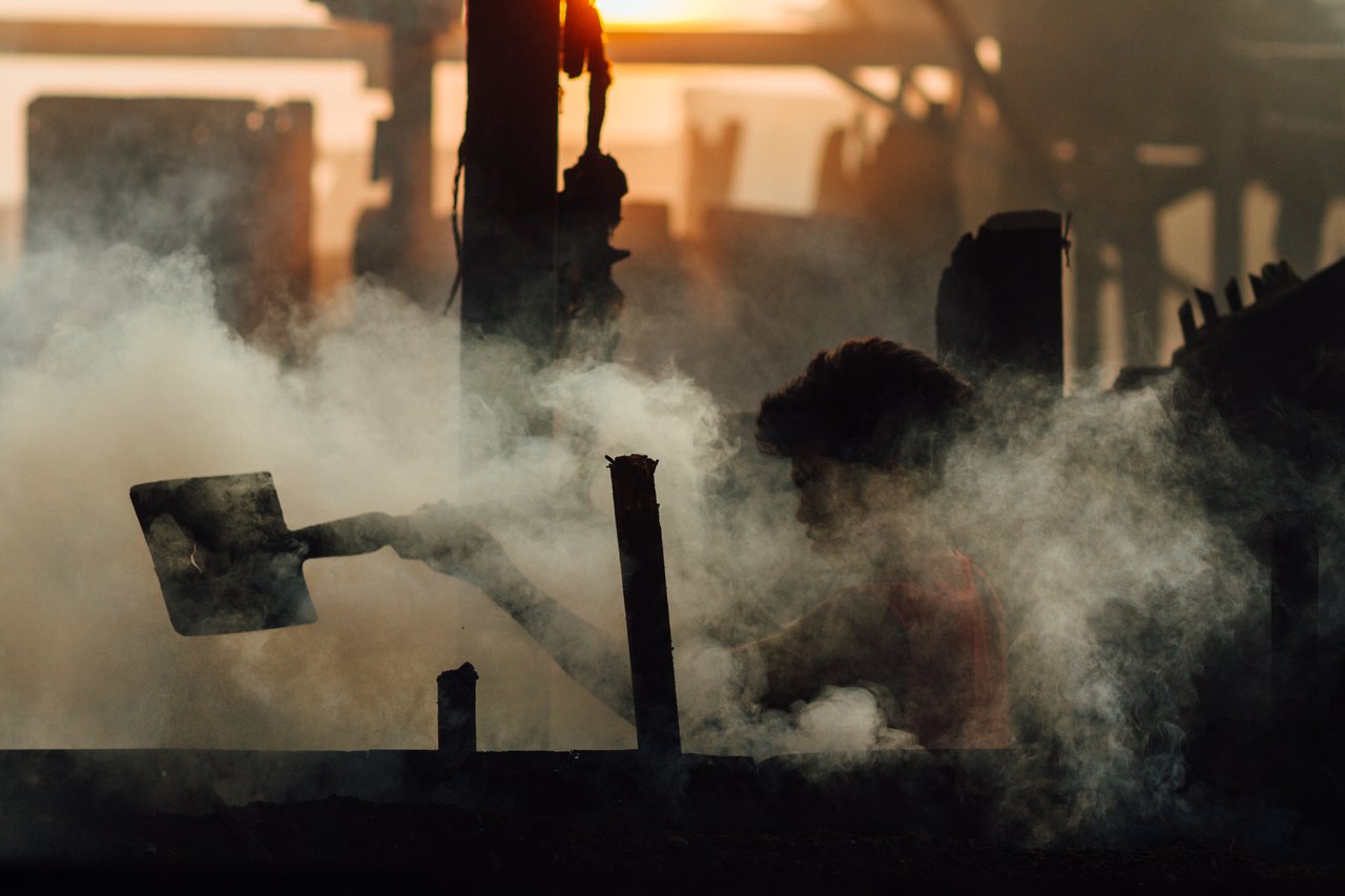 Man Shoveling Charcoal, Smokey Mountain Manila