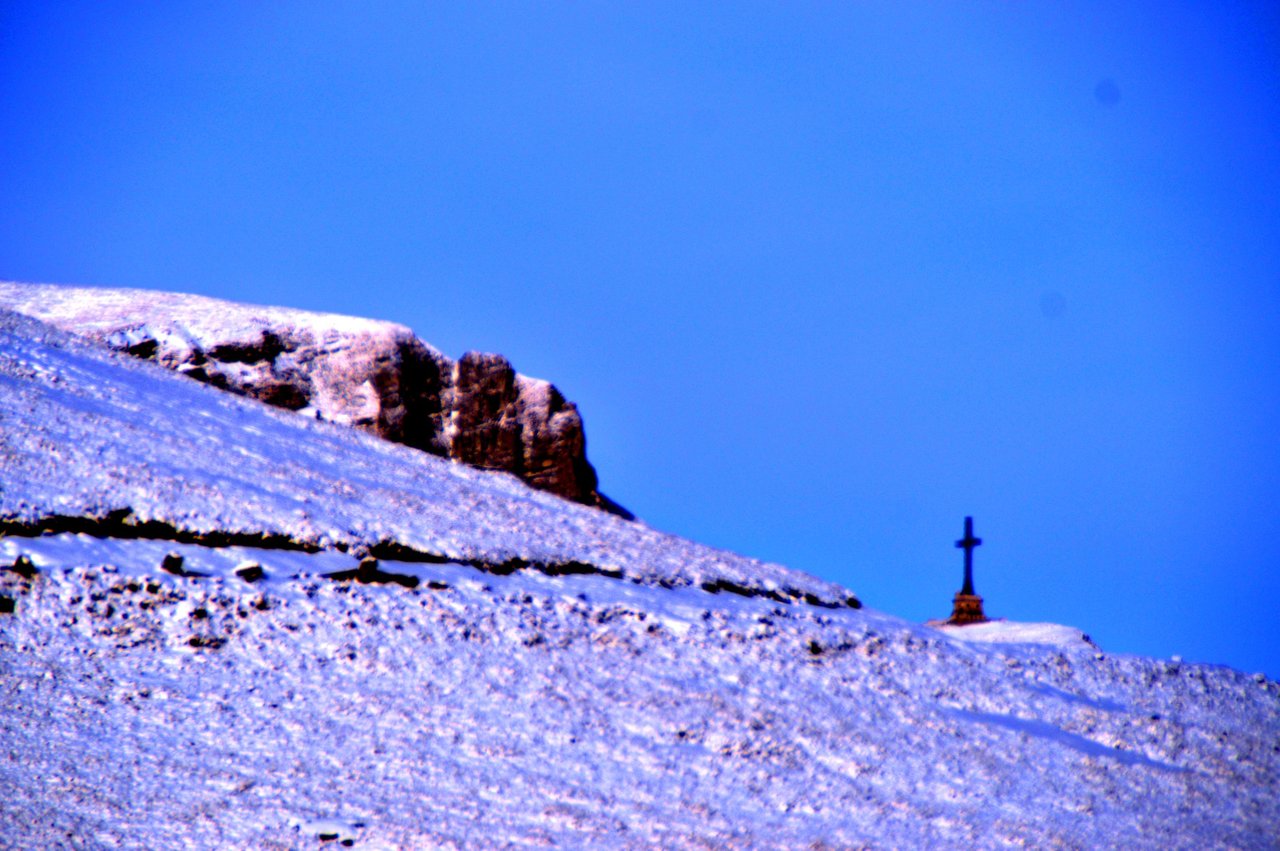 A crucifix marking the crossroads of the Bucegi hiking paths, Romania