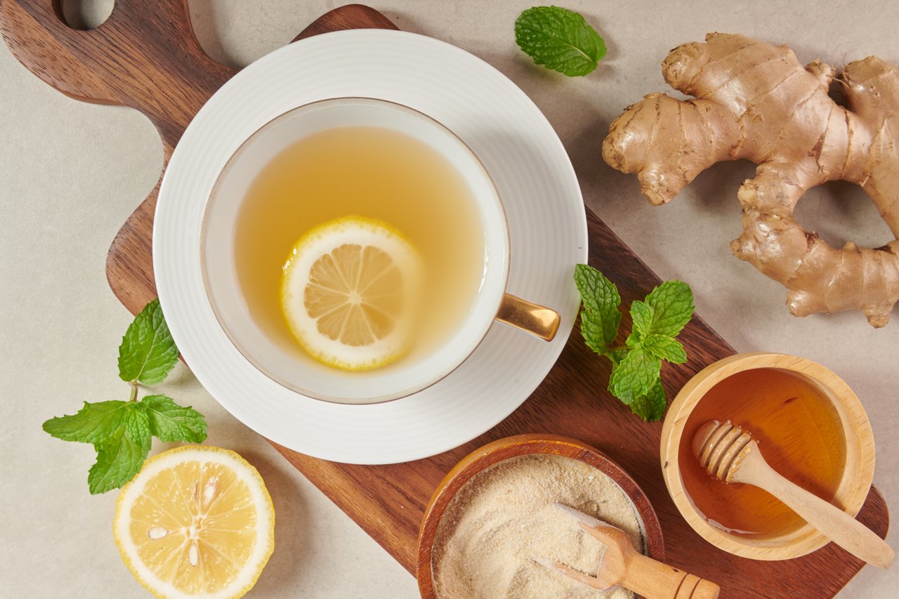 ginger-tea-ingredients-healthy-comforting-and-heating-tea-under-simple-recipe-ginger-tea-and-ingredients-lemon-honey-top-view-flat-lay-freshly-from-home-growth-organic-garden-food-concept.jpg