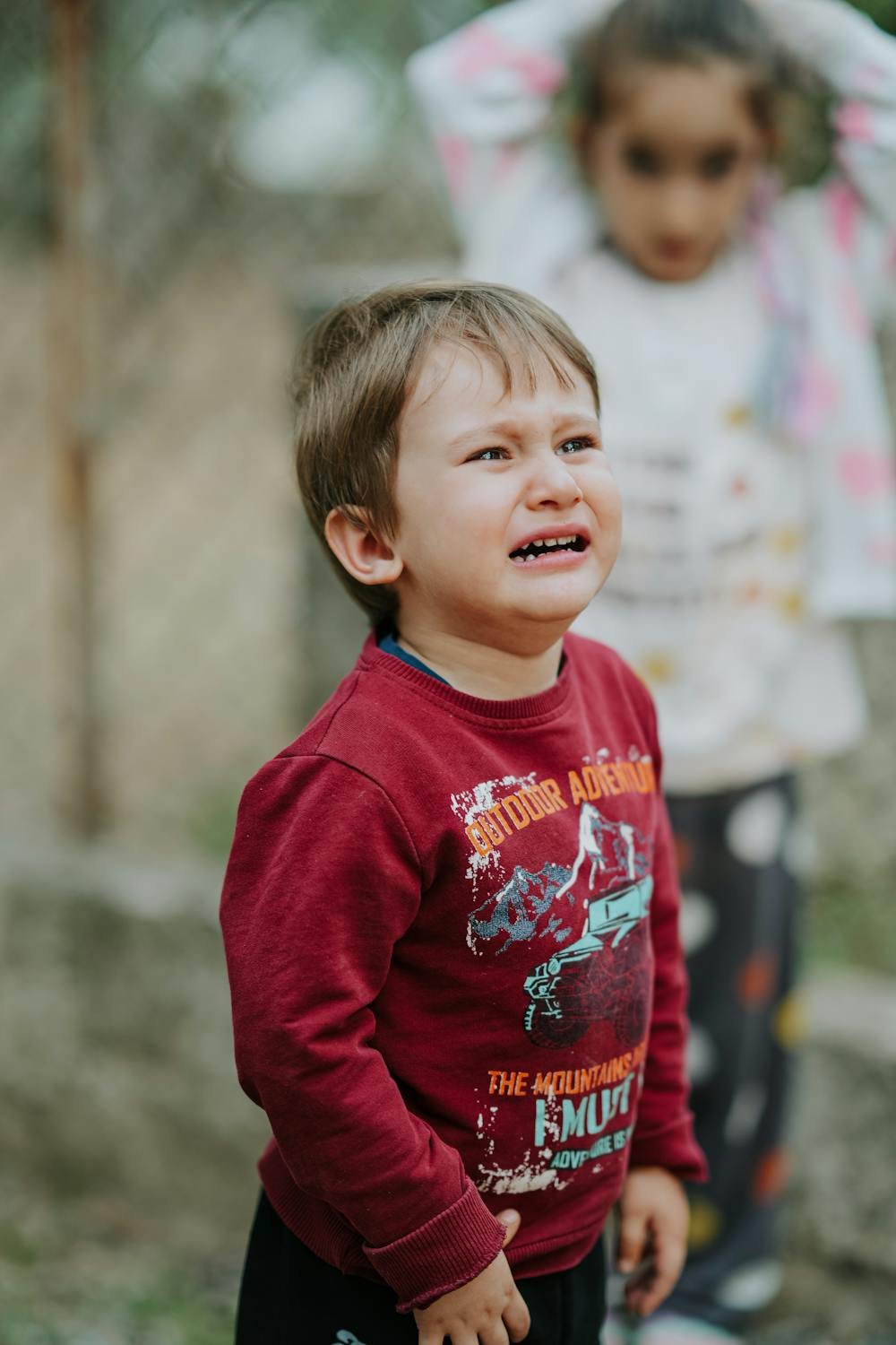 free-photo-of-young-child-crying-outdoors-in-casual-outfit.jpeg